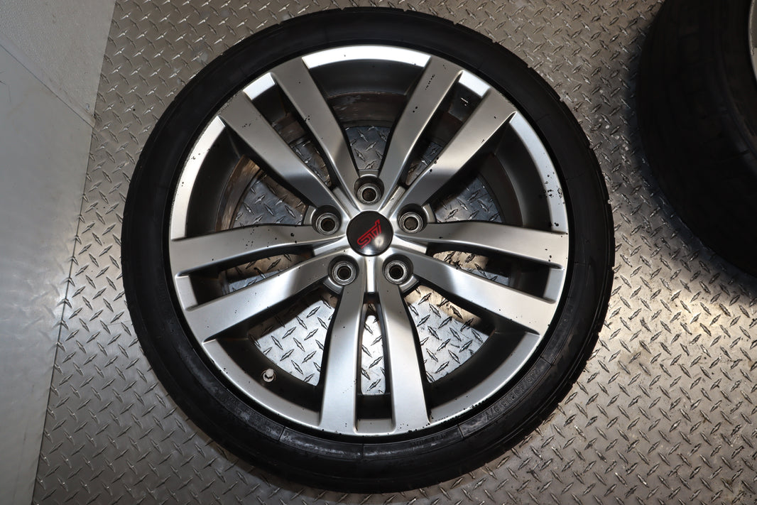 2008‑2014 Subaru WRX STI 18″ Wheels – 245/40R18 Tires – OEM